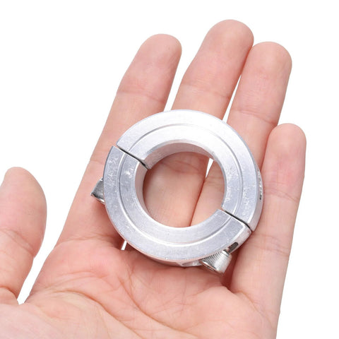 Double Split Shaft Collar Clamp For One Inch Shaft Aluminum Two Piece Clamp, hand-held view, fits 1 in shaft, 1.75 in OD, 0.5 in thick