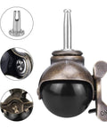 Four Pack 2 Inch Heavy Duty Ball Caster Wheels With Antique Brass Finish Swivel Stem Casters Replacement Set For Furniture Carts And Tool Boxes Includes Four Stem Sockets Smooth Quiet Rolling With Precision Ball Bearings, close-up of antique brass finish and swivel mechanism.