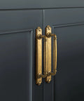 Antique Brass Drawer Pulls With Backplate Center To Center Five Point Zero Four Inches Zinc Alloy Cabinet Hardware installed on cabinet.