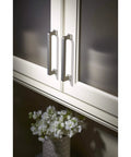 Top Knobs TK703HB Ascendra Three And Three Quarters Inch Center To Center Cabinet Pull Honey Bronze on white cabinetry