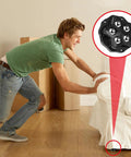 Man pushing sofa on Self Adhesive Caster Wheels For Carpet And Large Appliances, Swivel Steel Universal Appliance Sliders, 8 Pack Low Profile Black Casters With High Load Capacity Per Wheel For Moving Furniture And Kitchen Equipment