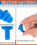 Close-up of blue silicone earplug with Christmas tree shape and cylindrical tail, highlighting soft material and design features