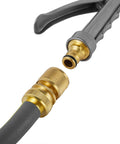 Solid Brass Garden Hose Quick Connect Kit Three Quarter Inch GHT Threads, Five Piece Set With Three Male And Two Female Connectors, No Leak Water Hose Fittings, Easy Snap On Quick Connect System For Garden Lawn And Irrigation Hassle Free with a garden nozzle connected.