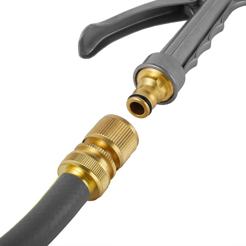 Solid Brass Garden Hose Quick Connect Kit Three Quarter Inch GHT Threads, Five Piece Set With Three Male And Two Female Connectors, No Leak Water Hose Fittings, Easy Snap On Quick Connect System For Garden Lawn And Irrigation Hassle Free with a garden nozzle connected.