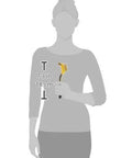 Person holding a Brass Mini Brush for Cleaning with Soft Grip, 1/2 inch, Yellow/Grey, shown alongside a scale of 7.3 inches.