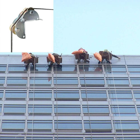 Pulley Hoist in use on building facade with workers, showcasing Material Handling and Moving Lifting with Tackle Pulley System