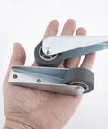 Gate Caster Wheel Replacement 1.6 Inch Rubber Rolling Swivel Casters Non Slip Pulley Directional Wheel shown held in hand