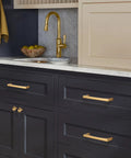 Champagne Bronze Oval Cabinet Knobs 10 Pack Single Hole Cabinet Pulls for Dresser and Kitchen Cabinets on dark cabinetry