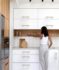Modern kitchen with 10 Pack Champagne Bronze Cabinet Pulls 5 Inch 128mm Honey Bronze Kitchen Cabinet Handles installed on white cabinets.