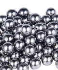 Close-up of 100PCS 1/2" Inch Diameter Hardened Chrome Solid Steel Bearing Balls (12.7mm) showing smooth, reflective surfaces.