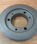 Compact SDS pulley with 5 inch outer diameter and 2-1/8 inch bore laid on wooden surface for power transmission in CNC setups