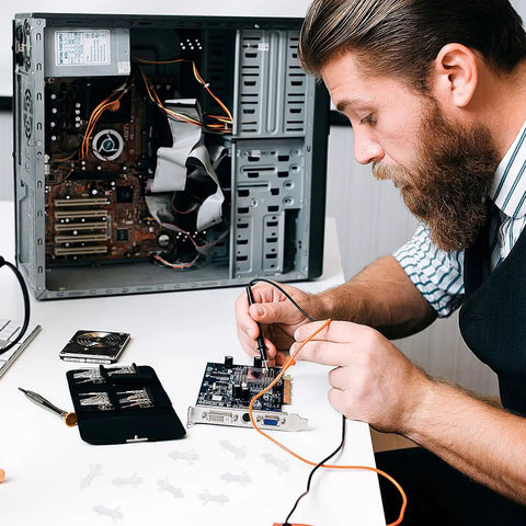Man assembling electronics using 100 Pack Nylon PCB Standoffs With Reverse Locking Snap In Design, non-conductive spacers visible.