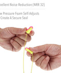 Hands holding Laser Lite High Visibility Corded Disposable Foam Earplugs 100 Pairs Pink And Yellow For Distinctive Visual Safety NRR 32