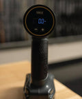 Close-up of the Wrench AutoTorque Screwdriver with Digital Display, Integrated Torque Limiter, for Gunsmithing on a wooden surface.