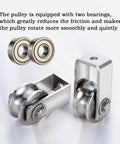 Dual-bearing cable pulley wheel set for rope systems, wall or ceiling mounted, quiet operation using two 608 bearings shown in close-up