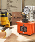 Electric Hydraulic Pump, 10000 PSI 750W 110V, 488 in³/8L Capacity, shown powering a punching machine on a workbench.