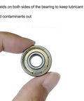 Close-up of 24 PCS 608-ZZ Ball Bearing showing double metal shield for furniture wheels, skateboards, scooters, and roller blades.