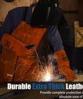 Person welding while wearing leather welding apron with 6 tool pockets, heat and flame resistant cowhide, heavy duty blacksmith protective apron, brown.
