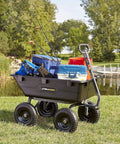 Heavy Duty Poly Yard Dump Cart with 6 Cu Ft Tub 1200 LB Haul Capacity Towable Utility Wagon loaded with tools and fishing gear