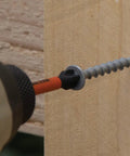 Ball End Hex Bit Set 20 Piece For Impact Drivers 2 Inch installation into wood showing bit holder in use