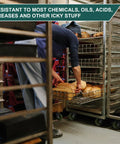 Bakery worker using 4x1.5 Inch High Temp Industrial Bakery Oven Caster Wheels Set Of 4 Heavy Duty for oven racks