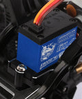 Close-up of 7KG 2065 Digital Servo Waterproof High Voltage Sub-Micro Shift Servo installed in RC crawler car chassis.