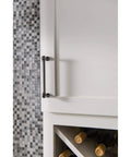 Kara Serene Series Center To Center Handle Cabinet Pull In Honey Bronze Finish installed on white cabinet.