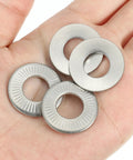 Hand holding M12 Belleville Spring Disc Washers 304 Stainless Steel Conical Knurled 30 Pack