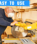 Person using circular saw with protective gear in workshop, two steel flange wedges nearby on table.