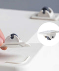 8 Pcs Mini Self Adhesive Wheels For Storage Bins And Boxes shown with strong adhesive and ABS/POM construction on a light surface.