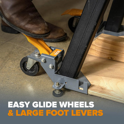 Mobile Base Kit PM-1100 For Heavy Equipment And Tools Adjustable Rolling Dolly Frame with caster wheels and foot lever in use.