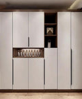 Modern wardrobe with 5 Pack Concealed Finger Pulls For Cabinets And Drawers, featuring sleek white doors and integrated handles.