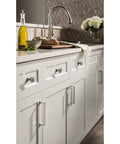 Modern kitchen with Top Knobs TK703HB Ascendra Honey Bronze cabinet pulls, showcasing premium quality construction and cohesive design.