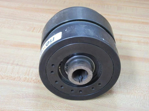 Nexen Group 801502 Air TL-A Torque Limiter with 0.875in bore on a wooden surface, showcasing set-screw mount and open design.
