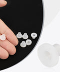 Flanged Sleeve Bearings Nylon Bushings With Flange 4mm Bore 5mm Outer Diameter 7mm Length White shown on hand