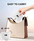 Hand placing Ultrasonic Retainer Cleaner 45kHz Dental Cleaning Machine for Dentures Aligners Braces Jewelry into a handbag