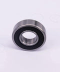 Single R8-2RS ball bearing with double sided seals, silver exterior, black seals, showing 1/2 x 1-1/8 x 5/16 inch dimensions for motors.