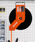 Retractable Air Hose Reel, 3/8 IN x 50 FT Hybrid Air Hose Max 300PSI, mounted on a pegboard in a workshop.