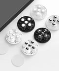 Self Adhesive Caster Wheels with 360 Degree Swivel Stainless Steel Rollers in black and white, six shown with adhesive backing, pack of four.