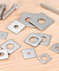 Stainless Steel Square Washer Plate Set For M8 Bolts 20x20mm 2mm Thick With 8mm Inner Diameter Ten Pack displayed on wooden surface