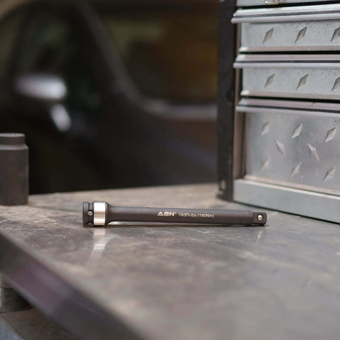 1/2in Drive 8in Long Torque Limiting Socket Extension Bar, 140 ft/lb CR-MO with Silver Color-Coded Aluminum Ring on workbench