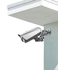 Universal Wall Mount Bracket With Adjustable Metal Arm for action cameras and smartphones installed under eave, showing dual ball head design.